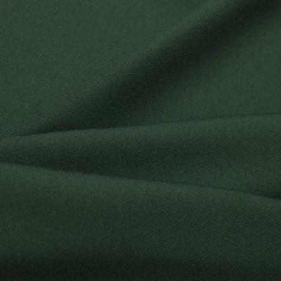 Ткань костюмная 21010 2076, 225 гр/м2, шир.150см, цвет т.зеленый - купить в Нижневартовске. Цена 390.73 руб.